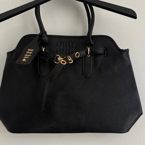 Miu Miu Black Satchel with Gold Accents